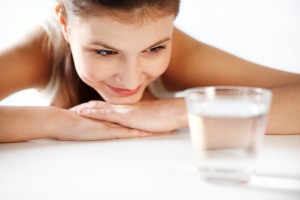 woman looking at her clean water