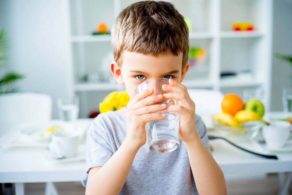 boy drinking water well water test kits enjoying whole house water filters